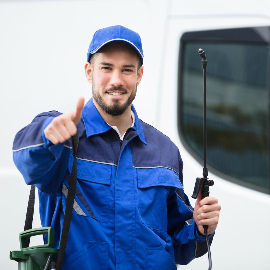 pest control expert giving thumbs up