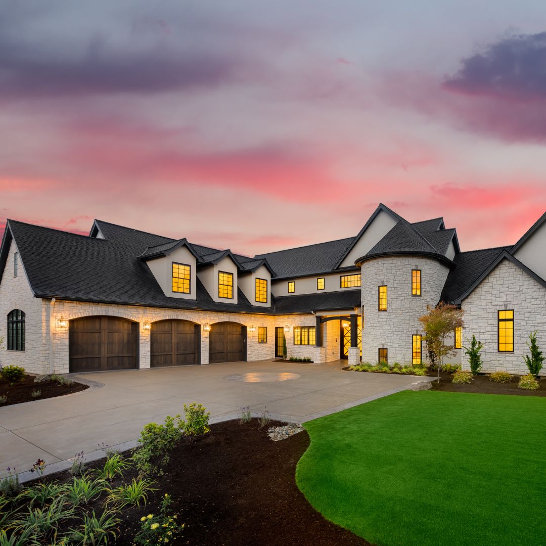 exterior of large home at dusk